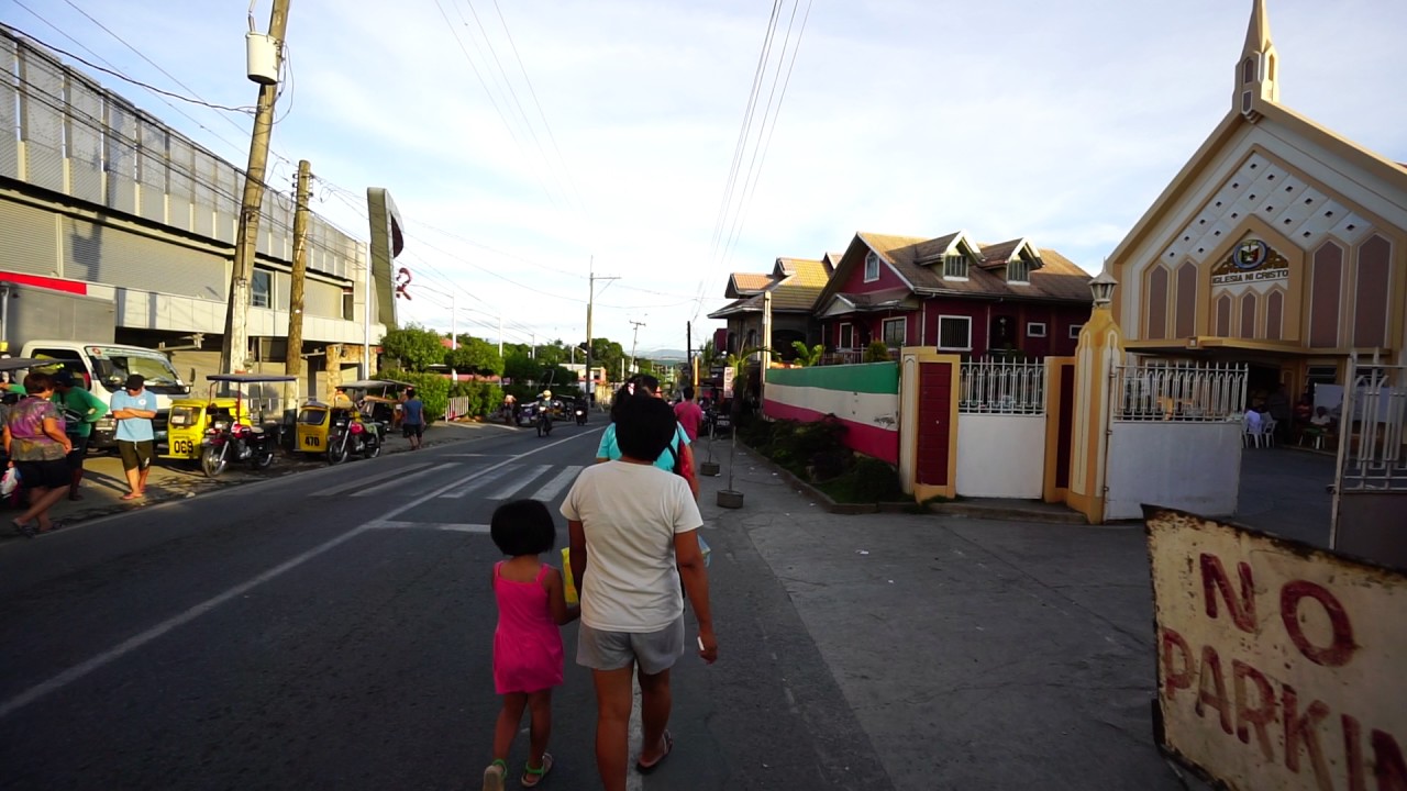 Philippines, Muzon, buing peanuts, chicken intestines and going by Jeep to SM City
