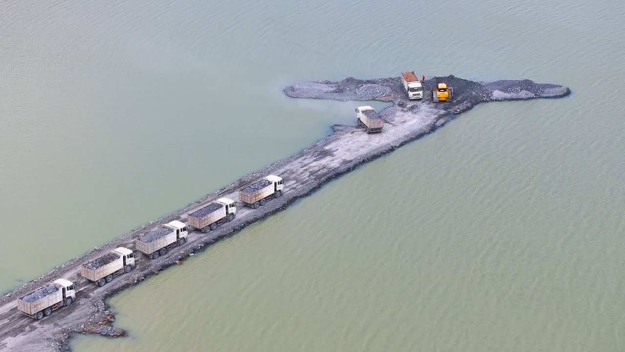 The Best Team Work Bulldozer SHHANTUI PusH Stone In Water And SHACMAN Truck Working