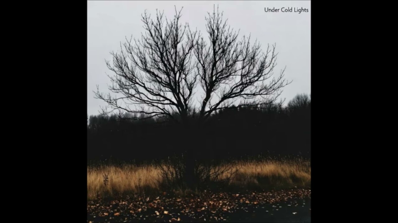 Under Cold Lights - Strange Land
