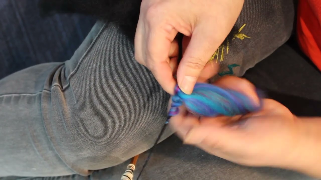 Beehive coiled art yarn spun on a spindle
