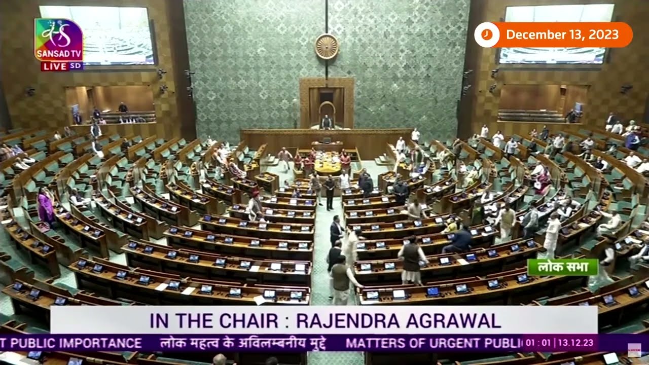 India: Security breach in parliament as man jumps on desks | Reuters
