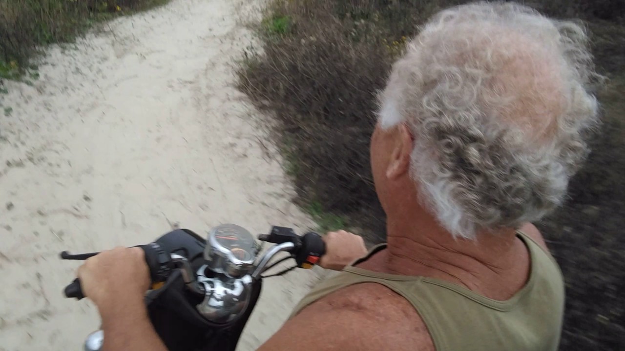 Moped on a beach