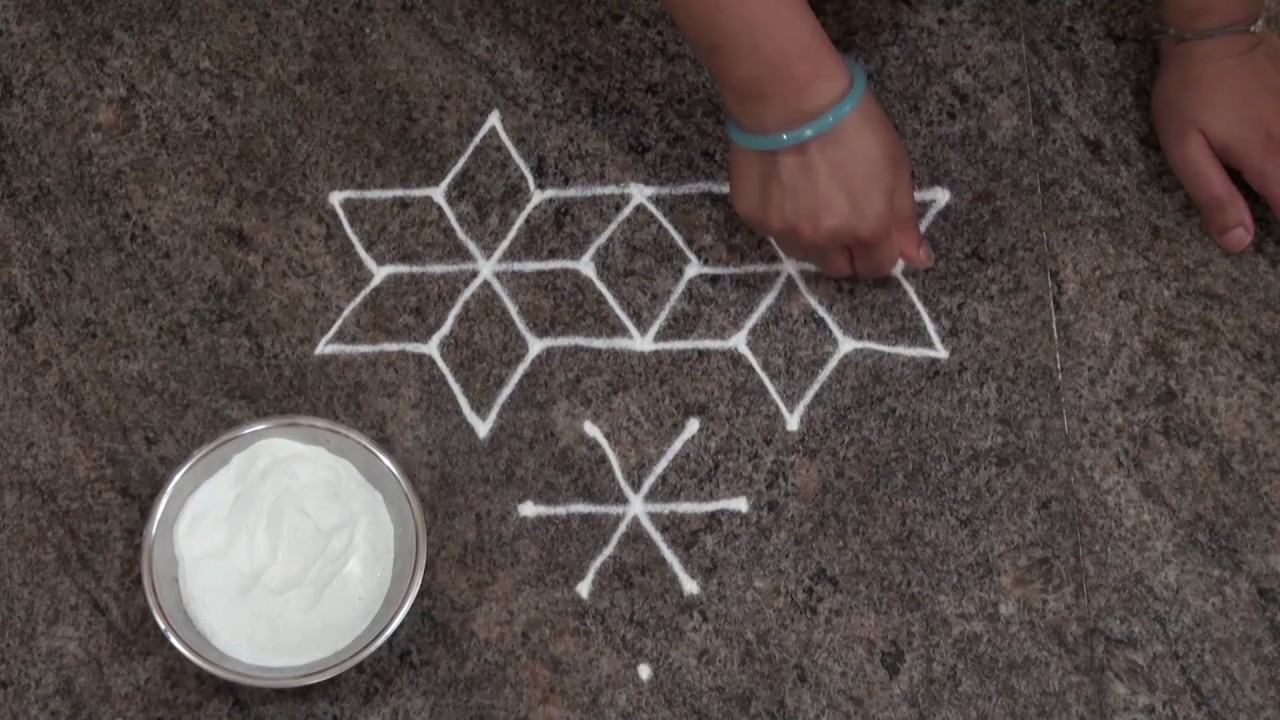 simple and easy flower basket rangoli design for beginners with 7 dots
