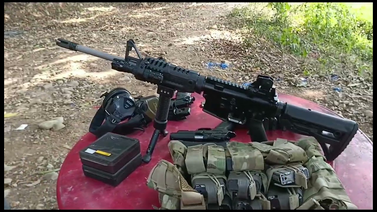 Firing range shooting caliber 45 pistol and M5 rifle