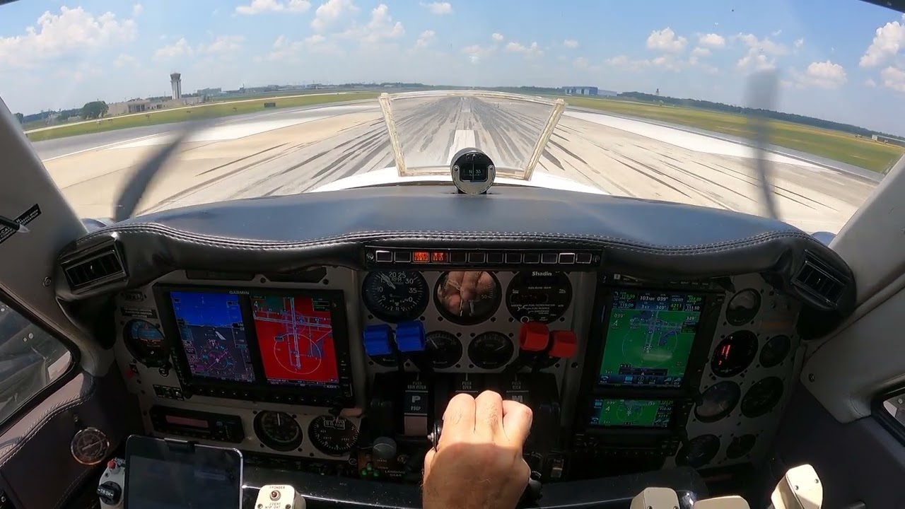 Beechcraft Baron 58P departing Pensacola