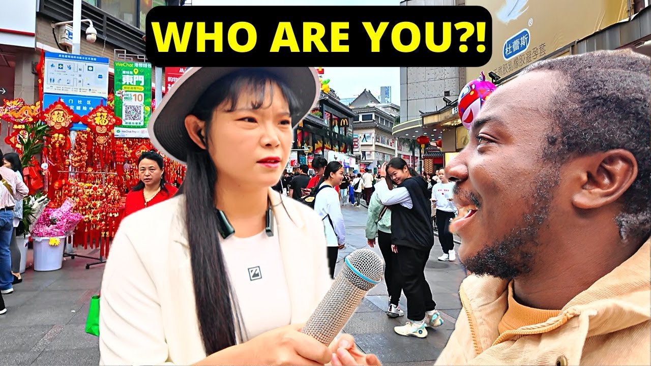 CHINESE GIRL SHOCKS AT A BLACKMAN SPEAKING CHINESE LANGUAGE IN THE STREET...BLACK IN CHINA