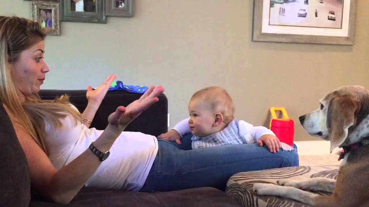 Baby laughing at mom eating