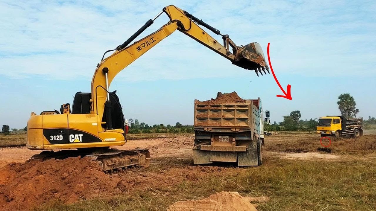 Excavator and Dump Truck Work in Mud | Real Construction Action
