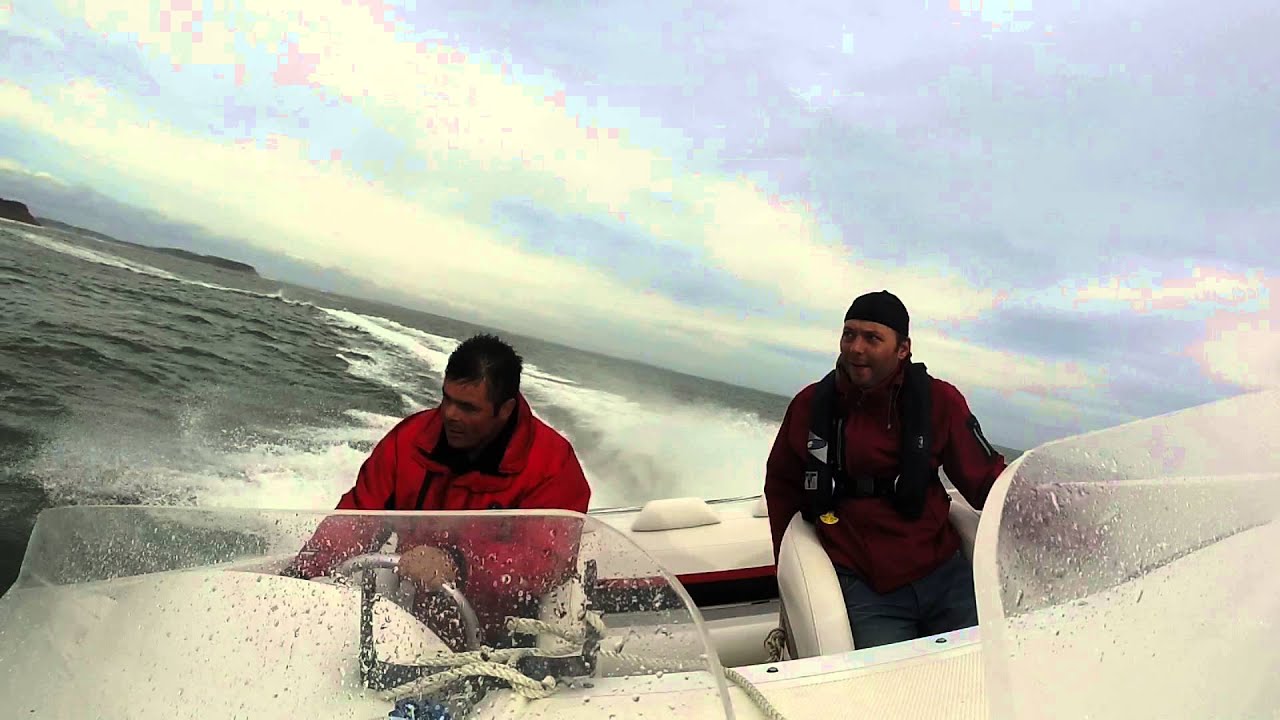 Launching a 2009 Baja Outlaw 20 ft in the air off a wave from a hurricane