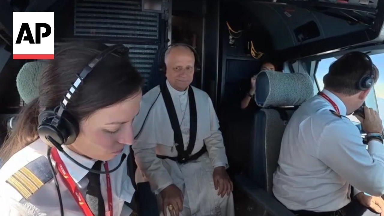 Pope Leo XIV sits in the cockpit for his flight from Madrid to Barcelona