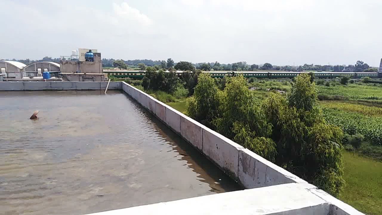 Train Passing through our site water ponding on roof for concrete curing
