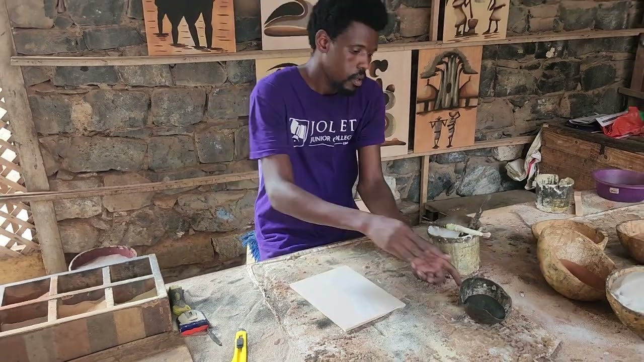 Dakar.  comment réaliser un tableau avec du sable