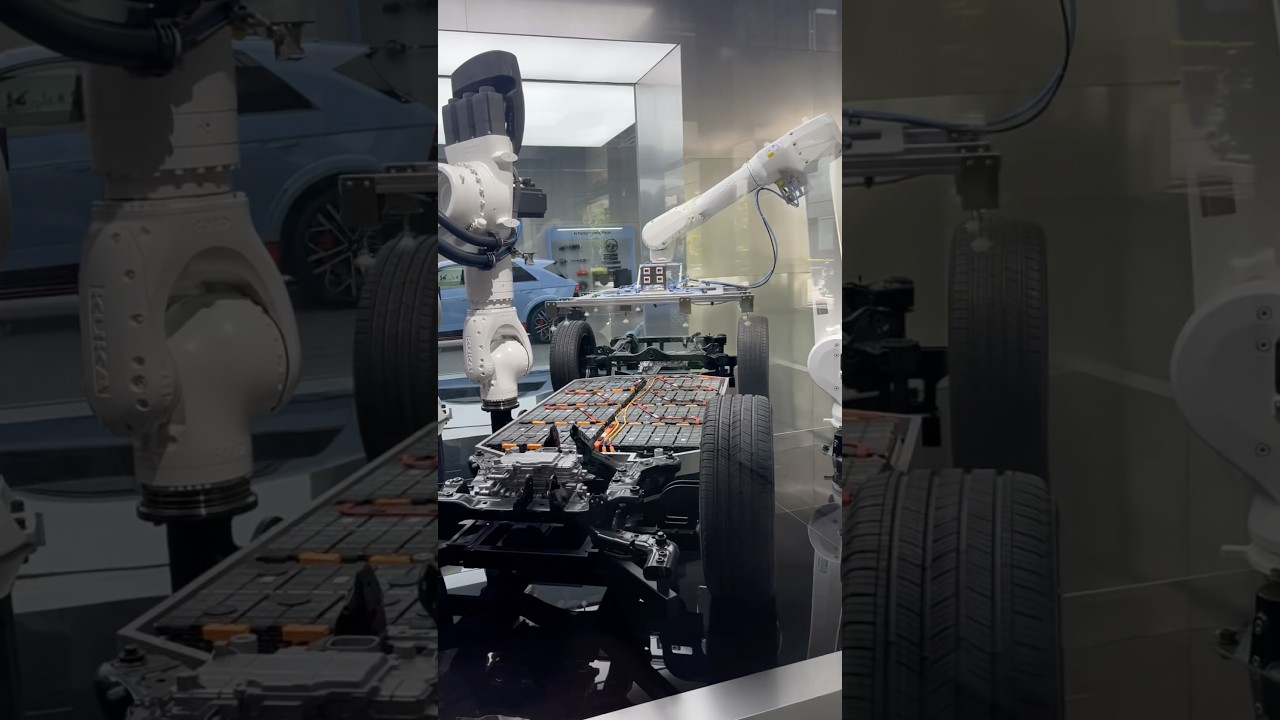 Robotic assembly of EV car battery #battery #automobile #cars #robot
