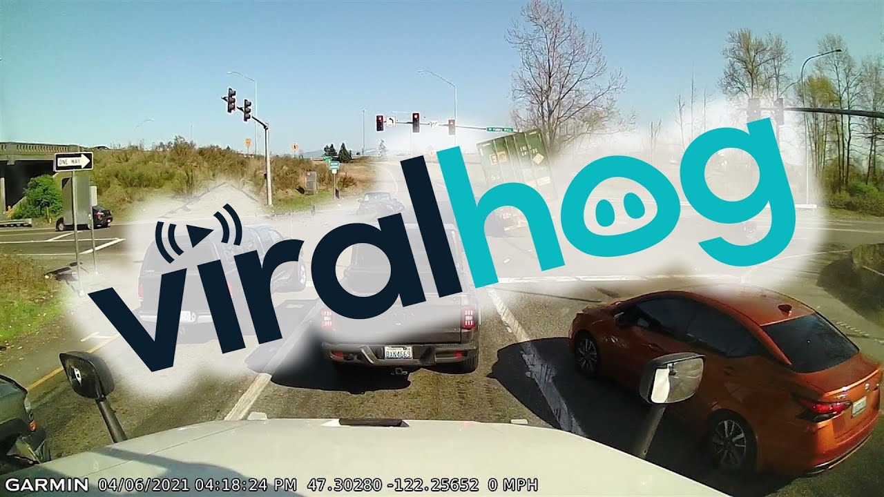 Brake Failure Sends Semi Truck Plowing Through Intersection || ViralHog
