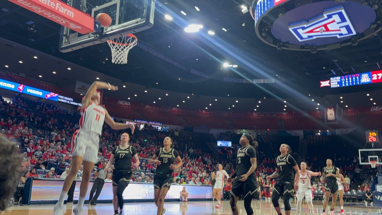 Becky Burke Arizona women’s basketball head coach and Noelani Cornfield