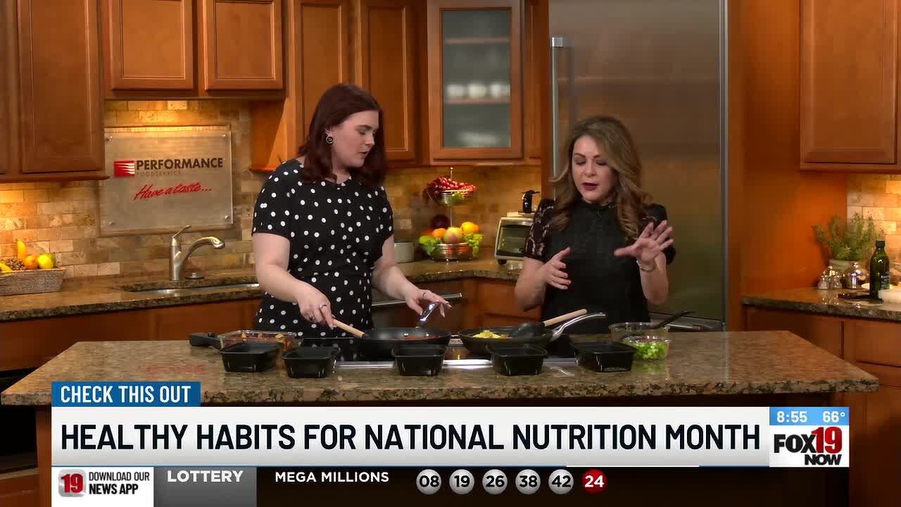 Dietician Karolin Saweres makes a balanced meal during National Nutrition Month