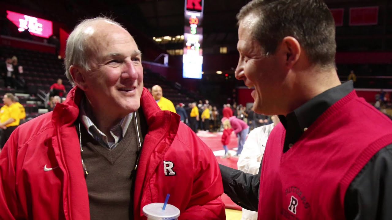 Rutgers President Robert Barchi cheers on wrestling team