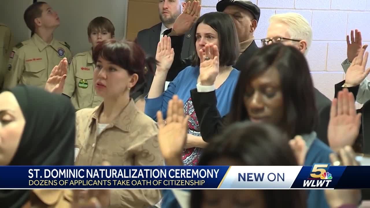 Dozens take oath of citizenship during naturalization ceremony at St. Dominic School