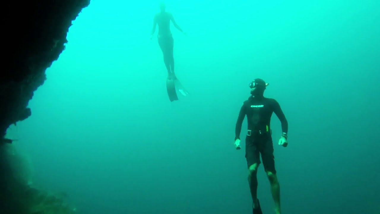 JP, Maja, Marc and Ken freediving Pescador Cave, Moalboal