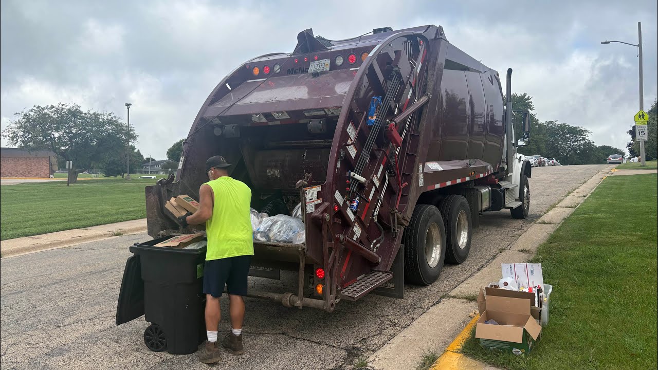 Faherty inc Freightliner McNeilus rear loader garbage truck on manual trash 