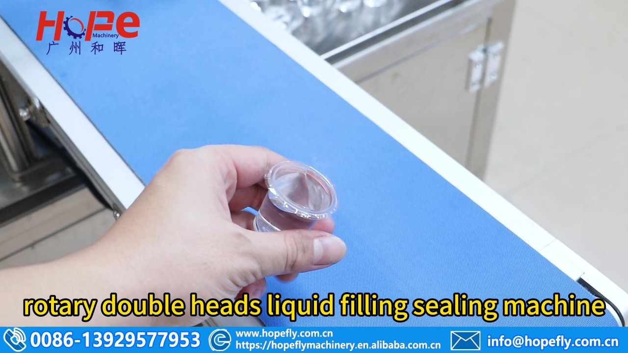 rotary double heads liquid filling sealing machine