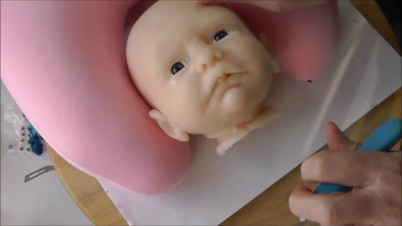 Cutting mouth on silicone baby doll to fit dummy/paci
