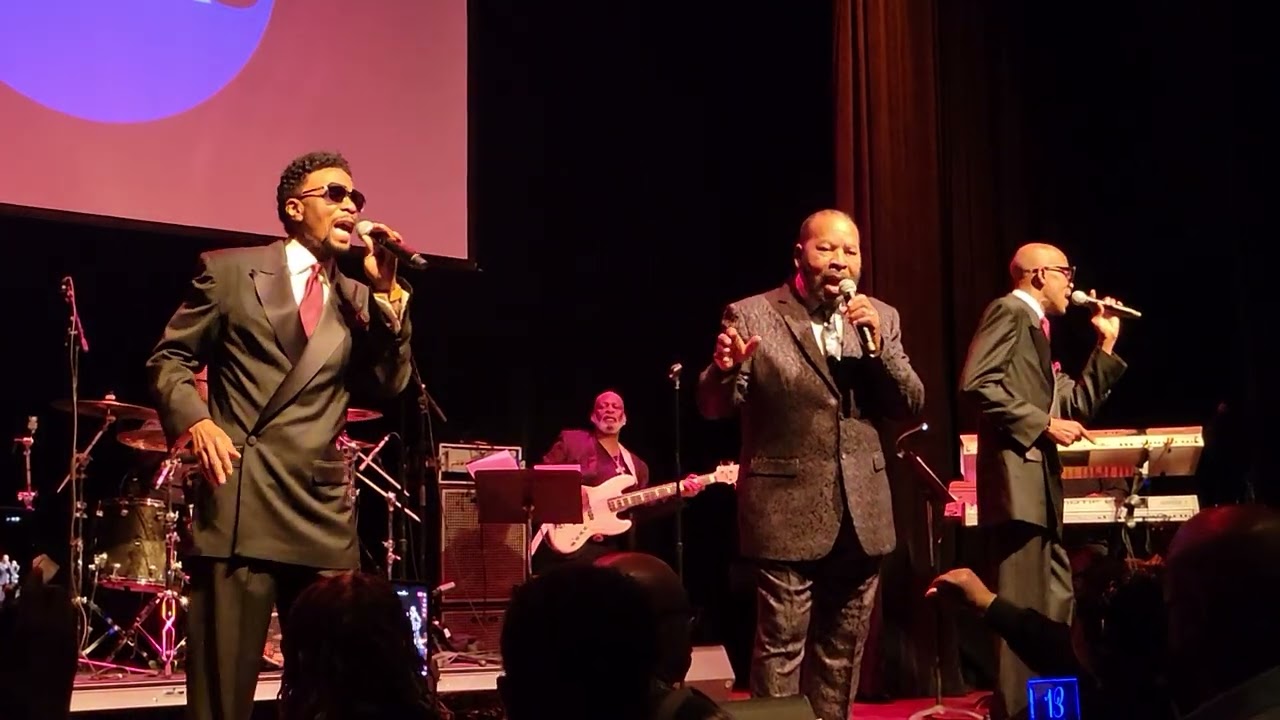 Ray, Goodman and Brown singing a medley of love songs, backed by The Unit Band