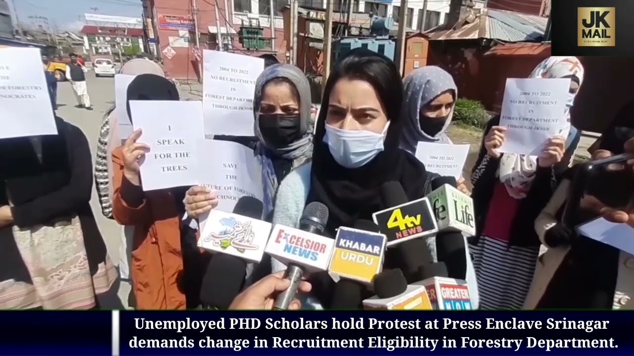 Unemployed PHD Scholars hold Protest at Press Enclave Srinagar demands change in Recruitment Eligibi