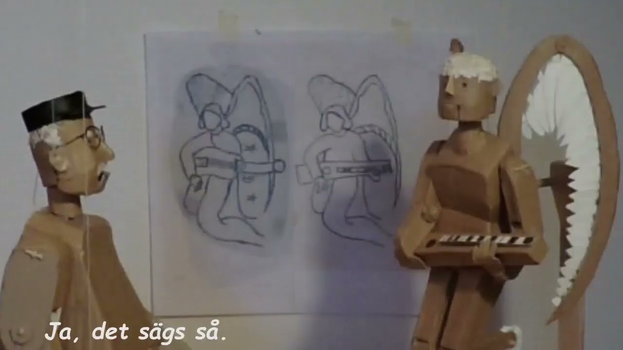 Den Gamle och Ängelen med musikinstrument