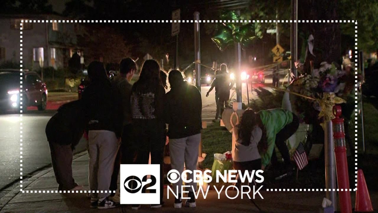 Farmingdale H.S. students comfort one another while processing deadly crash