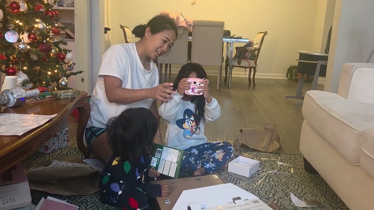 December 25, 2025 - Mishka and Keona opening their Christmas presents
