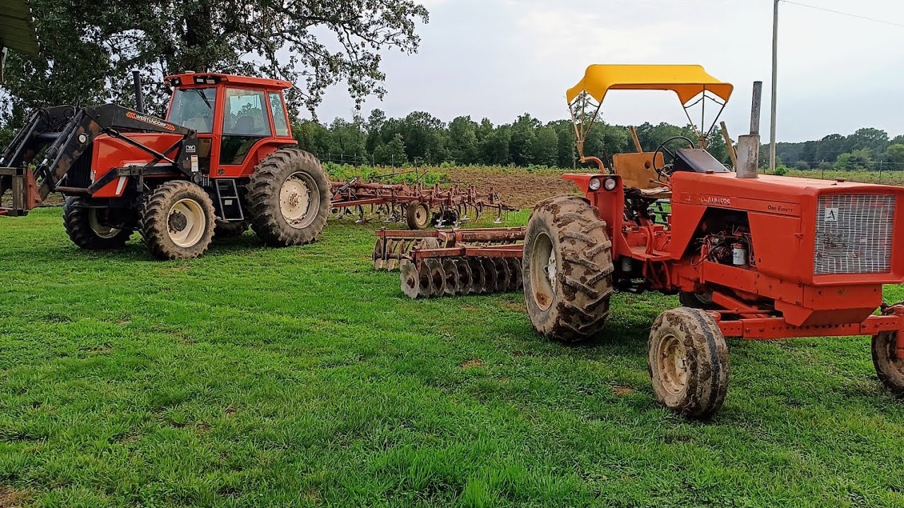 Turning woods into hay field with Allis Chalmers Tractors