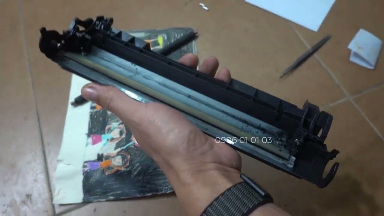 sửa lỗi máy in canon 2900 bản in bị đen giấy