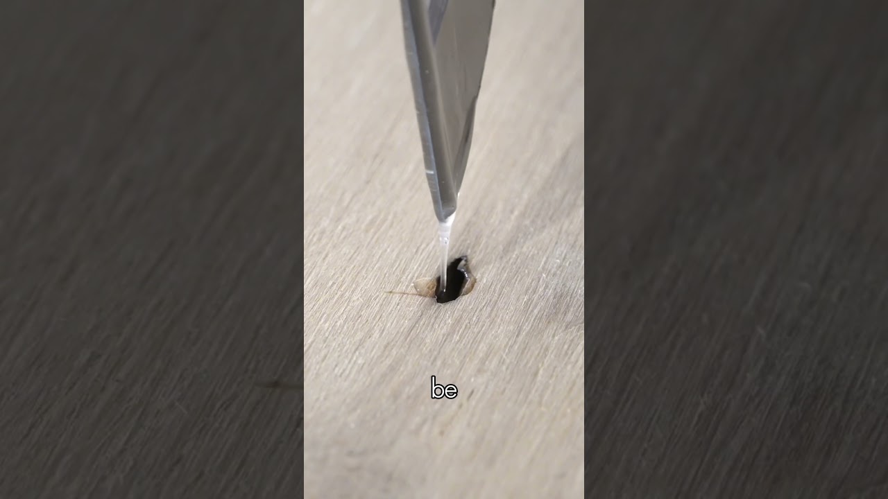 Filling knots with Epoxy 🧪#flooringexperts #woodworking #viral #construction #flooring #epoxy #fyp