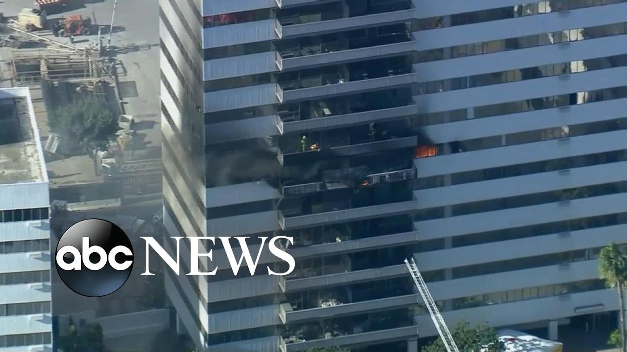 At least 11 injured, including baby, in high-rise blaze