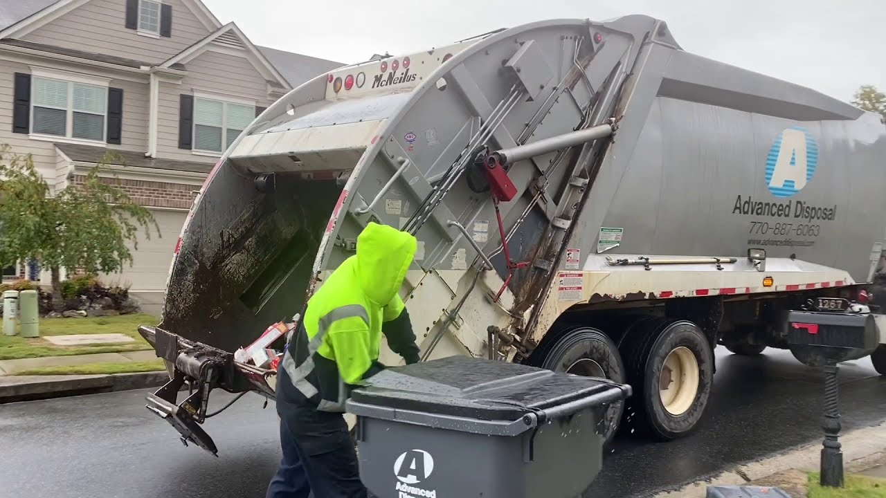 Advanced Disposal: Mack MR 32 yard McNeilus Rear Loader