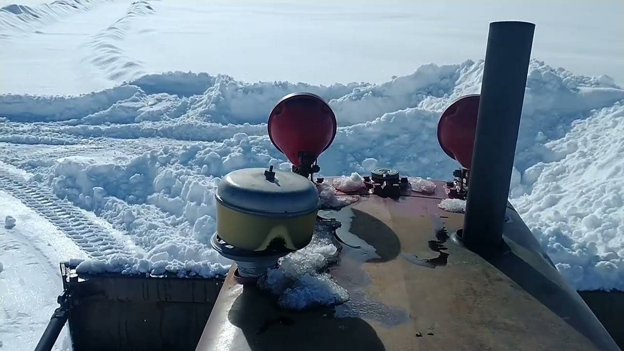 international td9 pushing snow