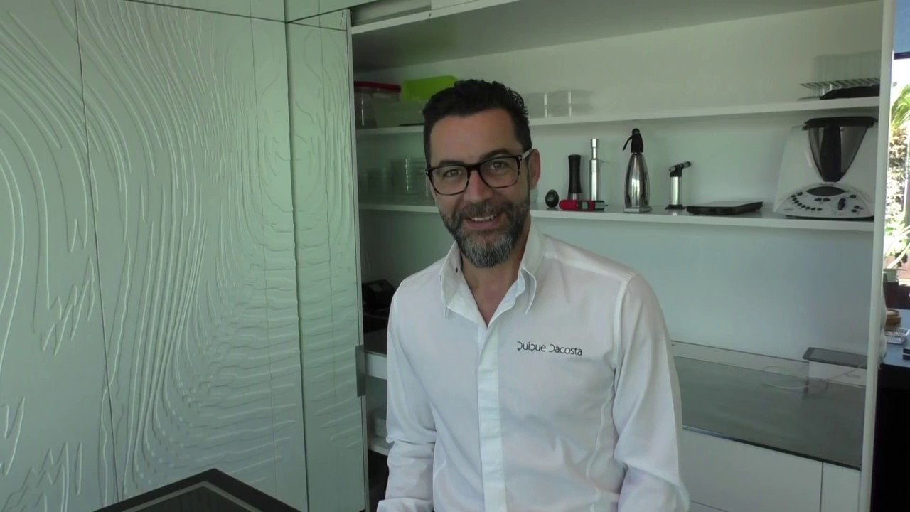 Chef Patron Quique Dacosta prepares an almond starter at his 3 Michelin star restaurant