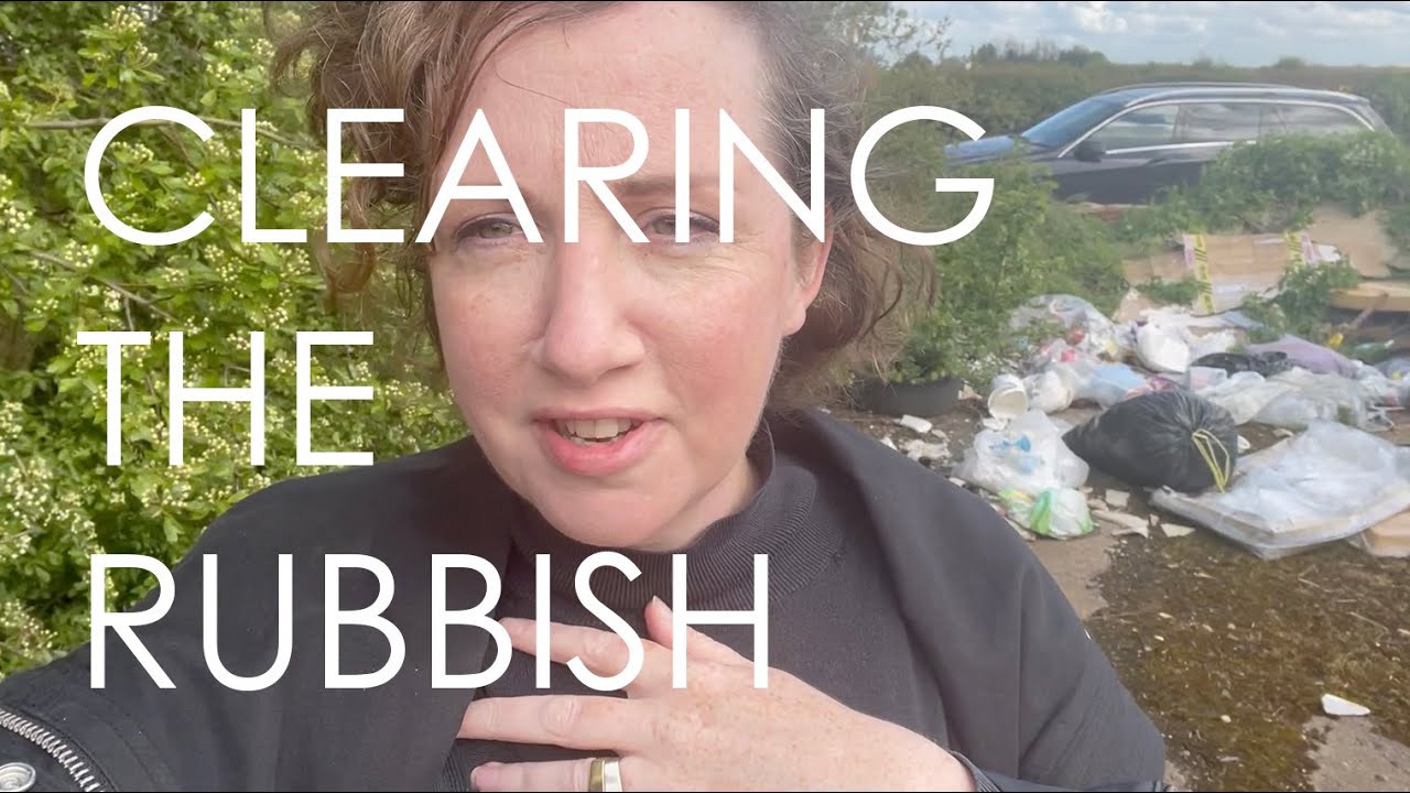 Clearing fly rubbish from the woodland