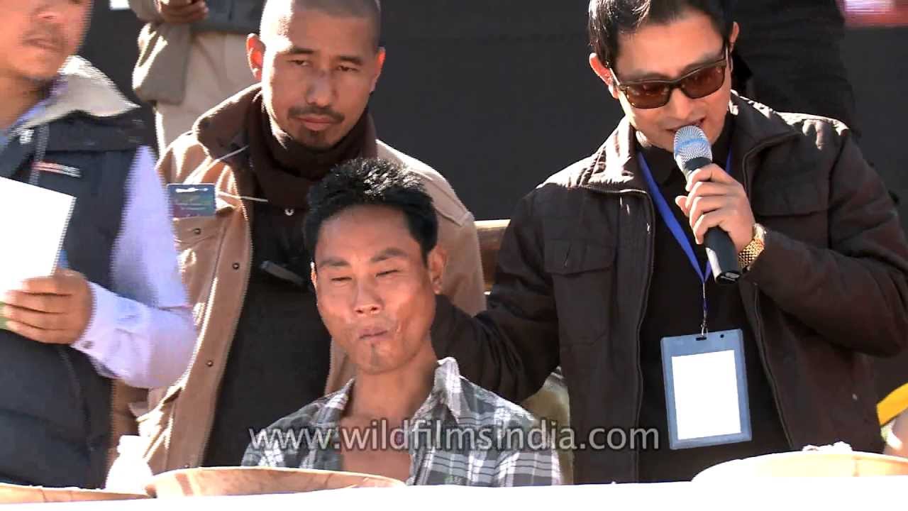Nagaland hornbill festival Pork fat eating competition