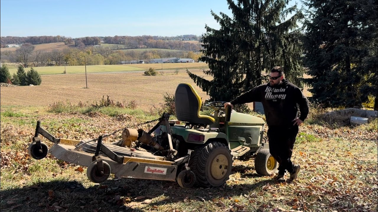 John Deere 455 with 60” finish mower.