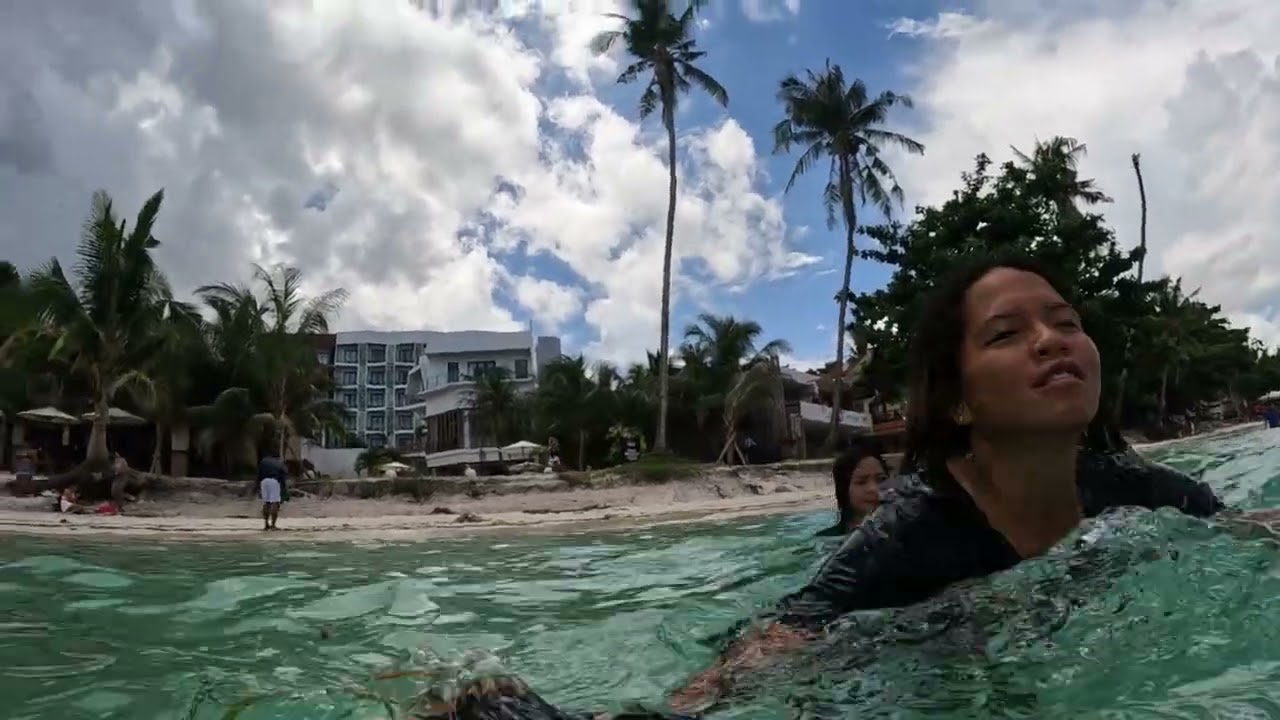 BEAUTIFUL FILIPINA ENJOYING IN THE WHITE BEACH
