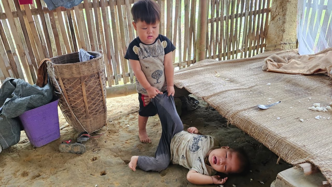 The mother went to pick corn to sell,the child stayed home crying and fell out of bed