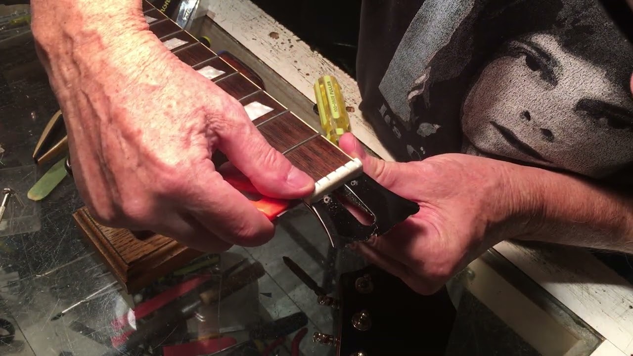 How to remove a plastic nut from an Epiphone electric guitar - Epiphone Firebird
