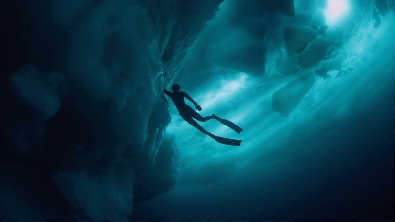 Freediver Anna von Boetticher Swims Underneath Greenland Icebergs