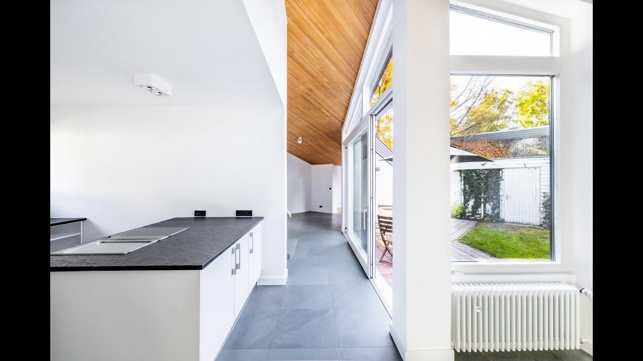 Hacker & Glass Immobilien München - ARCHITEKTENHAUS MIT PRIVATEM SEEZUGANGSRECHT AM STARNBERGER SEE