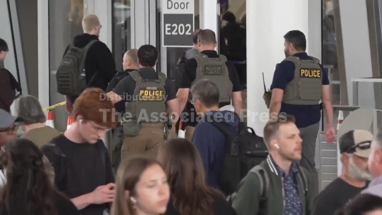 Federal officers spotted at Chicago, Philadelphia and Houston airports Tuesday