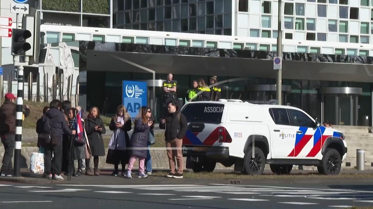 Rival groups of pro and anti-Duterte protesters gather in front of ICC building in The Hague