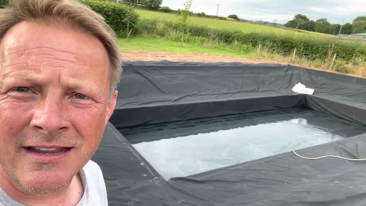 DIY Swimming Pond - Somerset. Day 11. Liner install