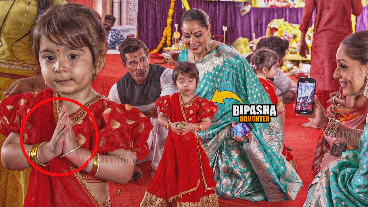 Bipasha Basu Daughter Devi Cutest Video infront of Devi with Mom and Dad at Biggest Durga Puja 2024